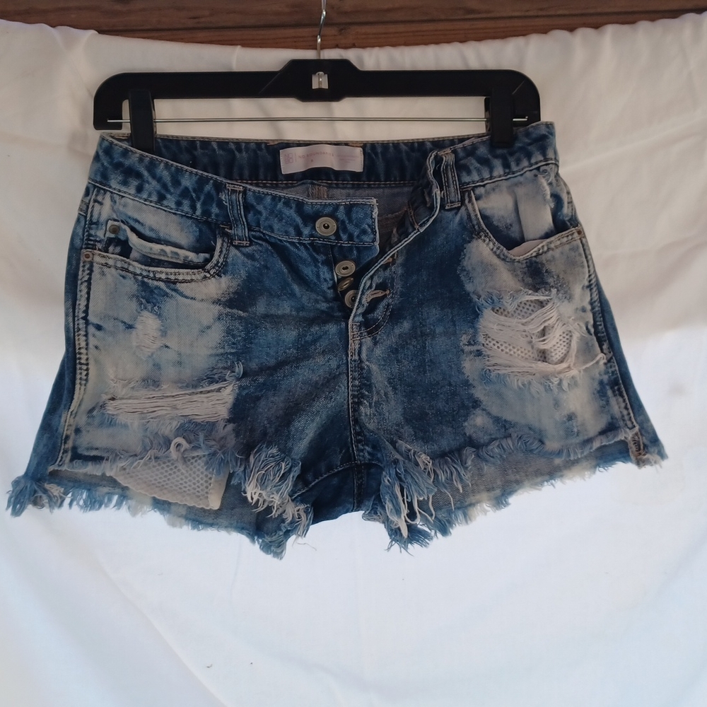 Cut off bleached button fly shorts